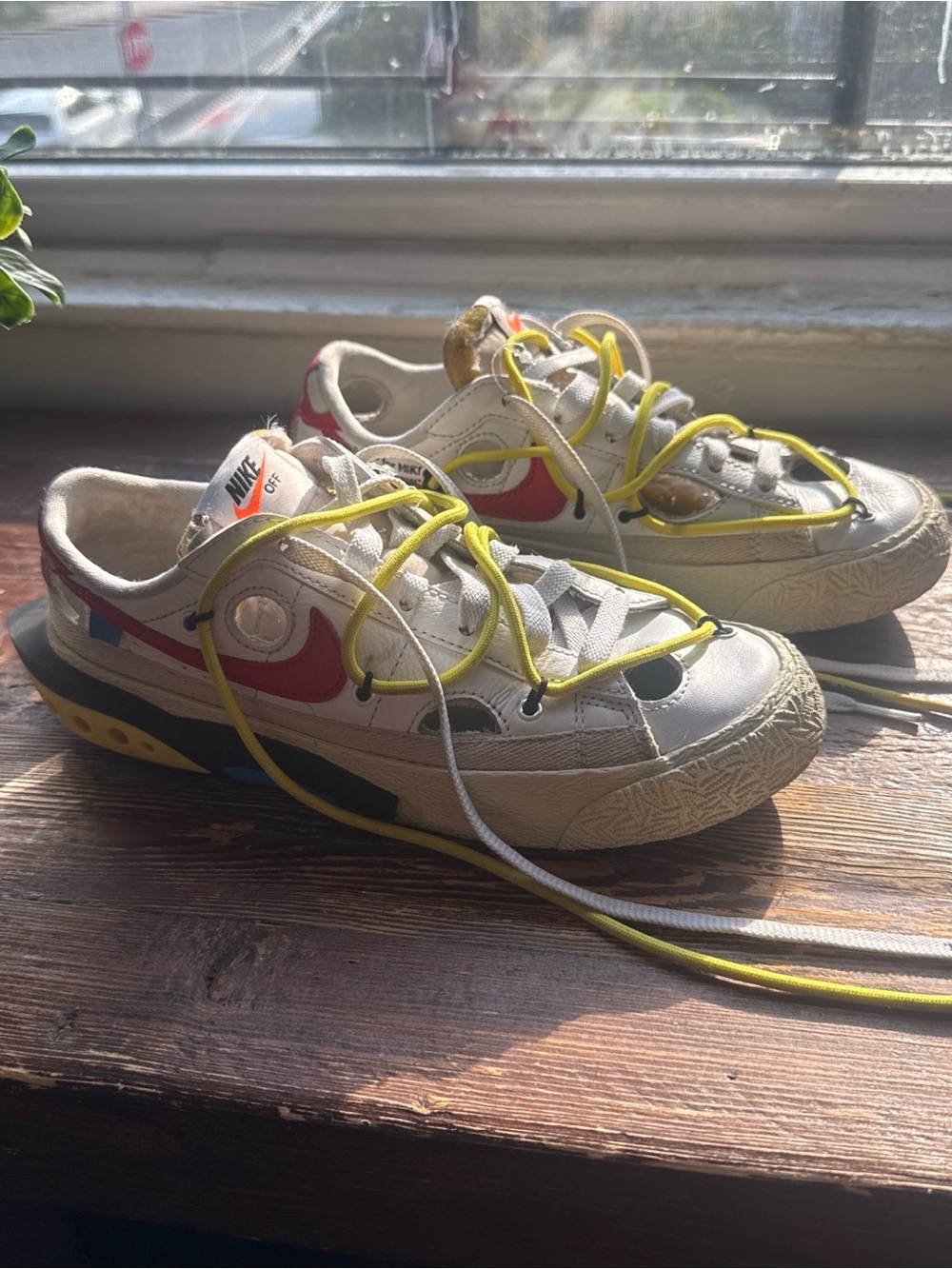 Nike Kids White Sneakers with Red Swoosh and Yellow Laces